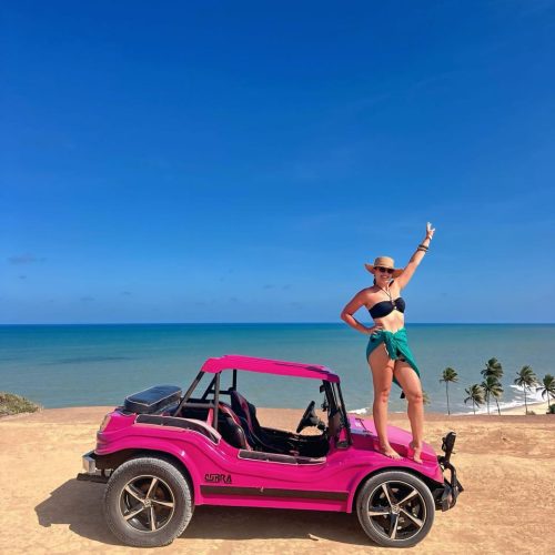 Vista do alto da falésia de Tabatinga (Mirante das Tartarugas) com mar azul turquesa.